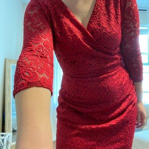 Wine red, lace, knee/midi length body con dress with 3/4 sleeves.